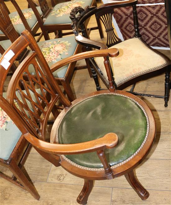 An Edwardian inlaid mahogany swivel chair and a corner chair